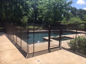 Black custom pool barrier in Denton, TX