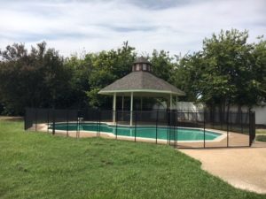 Black custom removable mesh pool fence and gate in Murphy TX