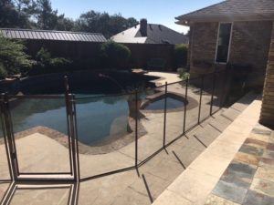 Bronze pool fence with a self closing gate in the Lake Highlands area of Dallas