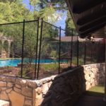 Black custom removable swimming pool fence in Fort Worth, TX